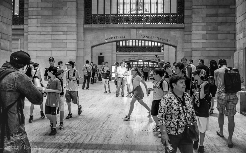 A couple poses for a Grand Central Station photo shoot